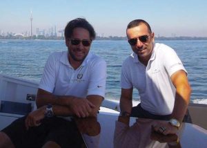 xecutive Yacht Partners Derek Mader and Ron Peruzza enjoying a day cruise with a client on Lake Ontario.