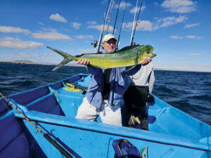 Gordon Cruise McBride holding the catch of the day.