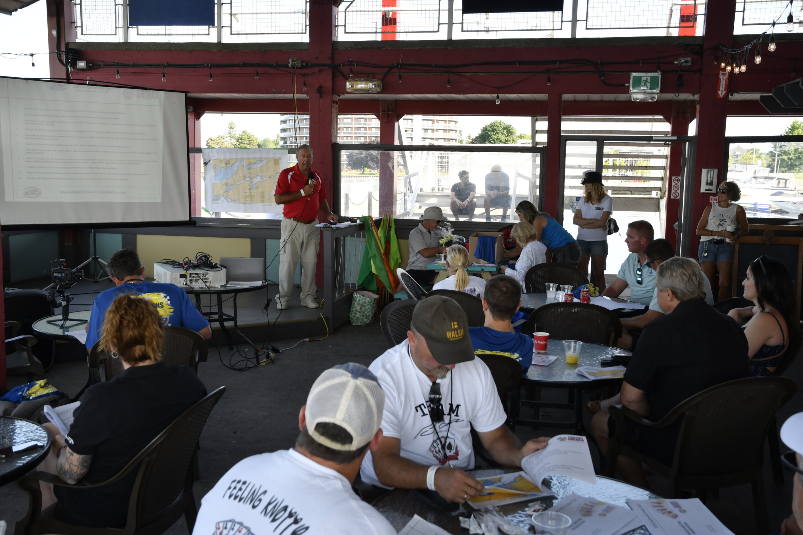 Dave Bodnar walking the participants through the Driver's meeting hosted at The Pier Restaurant.