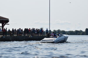crowds gathered at The Pier restaraunt in Belleville, ON greeting the boaters to start the Poker Run