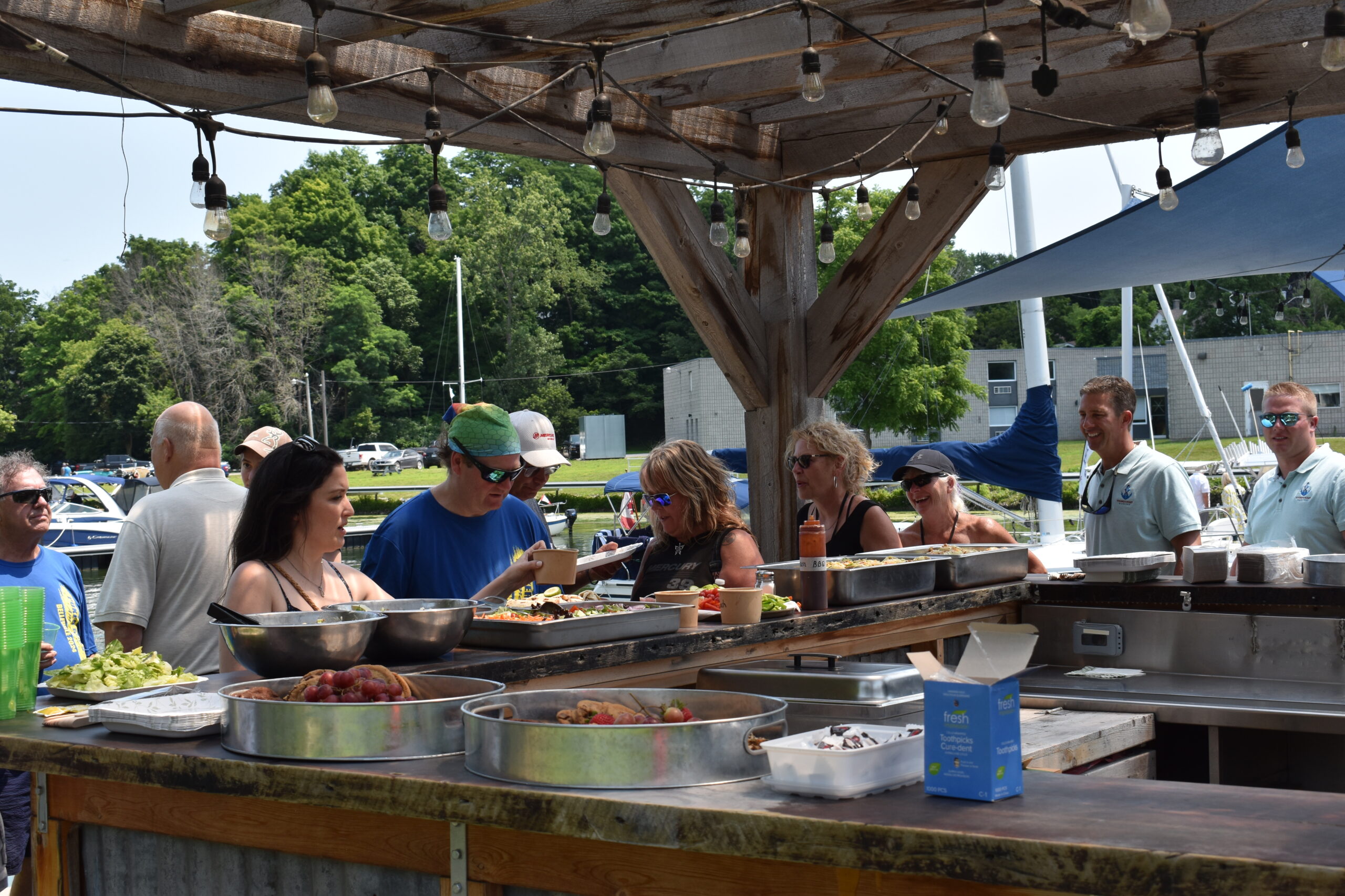 Participants enjoying a lunch supplied by Shoeless Joes at the card stop at the Picton Harbour Inn.