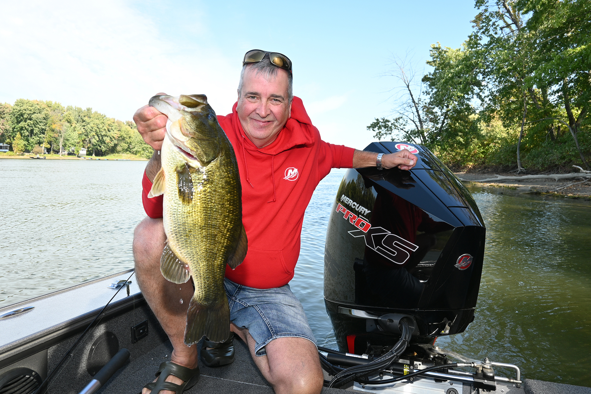 Patrick Campeau holding up a large fish